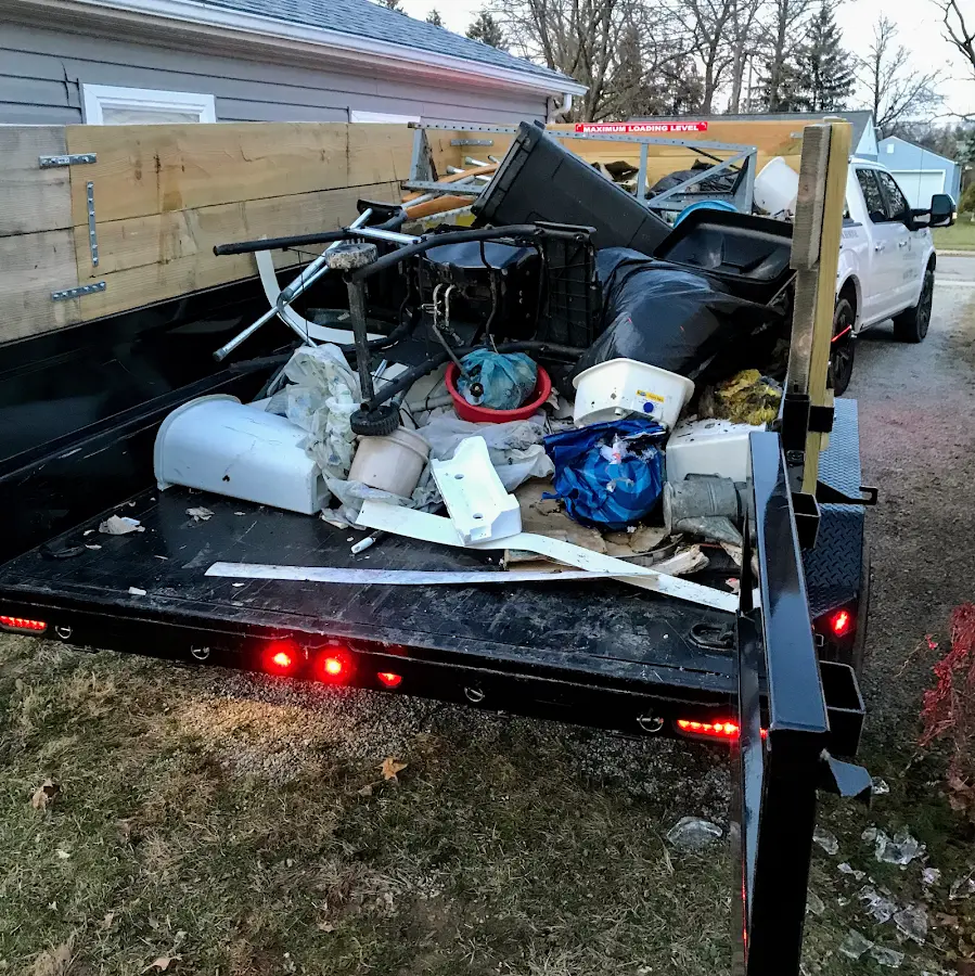 Roll-off dumpster delivered to a residential driveway in Pineville